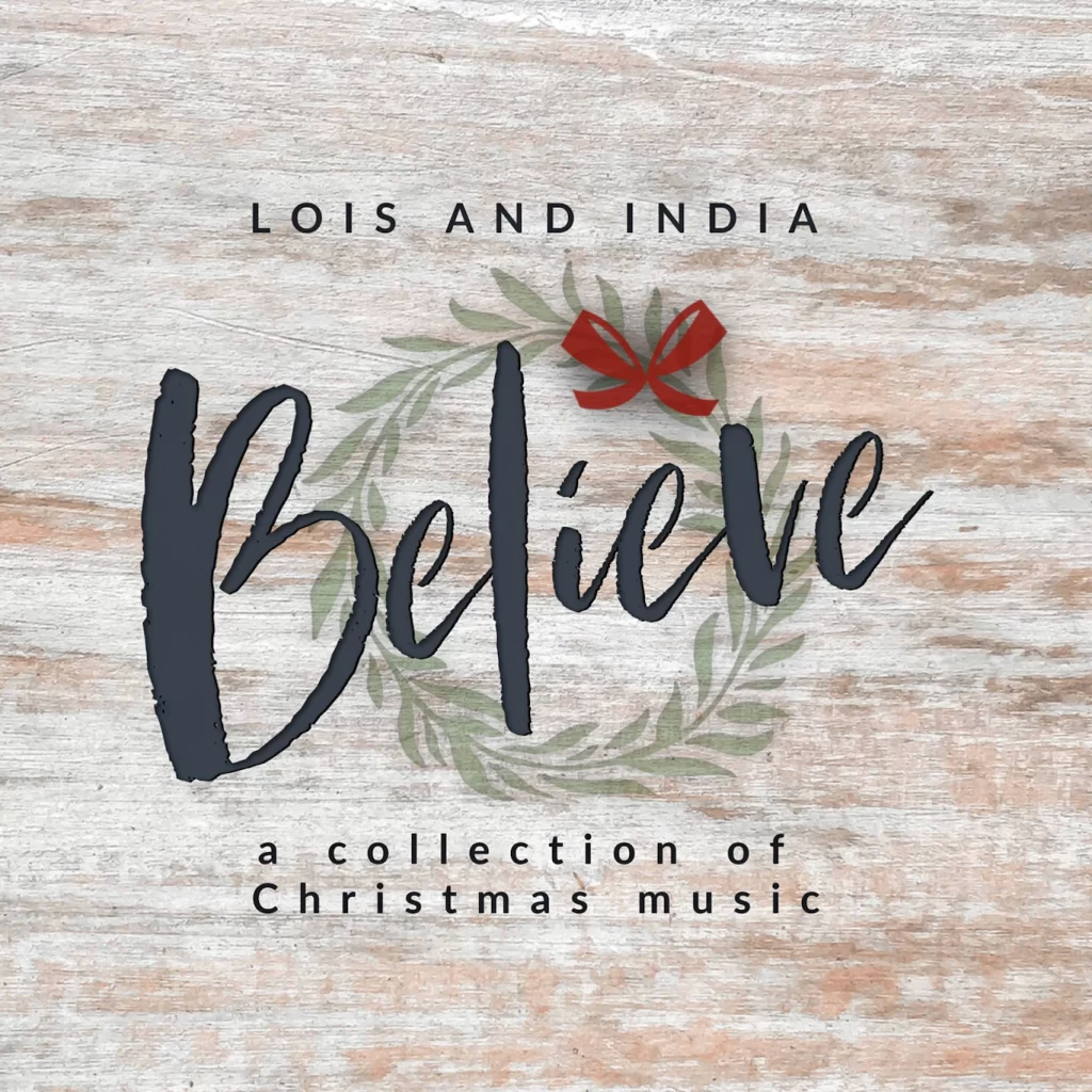 Cover Art for "Believe". It shows the title over a backdrop containing a festive wreath.